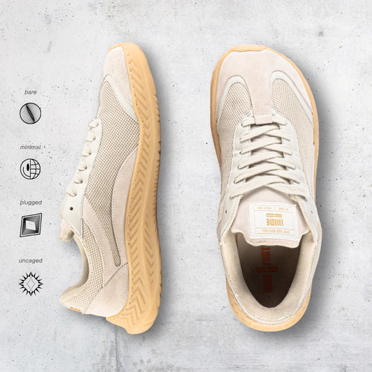 Beige barefoot and minimal sneakers with gum soles on a light gray background