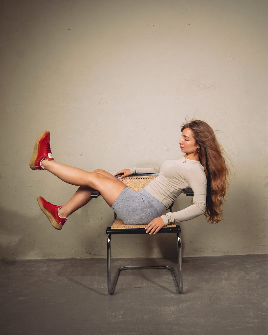 Barefoot sneaker Nude Red Hot Chili Peperoni lifestyle chair shot