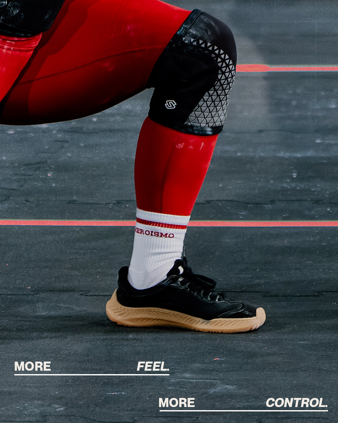 Athlete standing balanced in The Nude Foot barefoot shoes, more feel more control